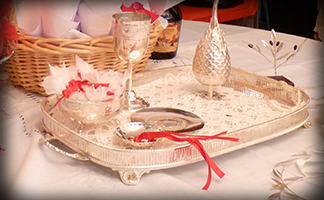 This is a picture of a Kapnistiri set used to bless the Bride or Groom at a Stolisma ceremony.